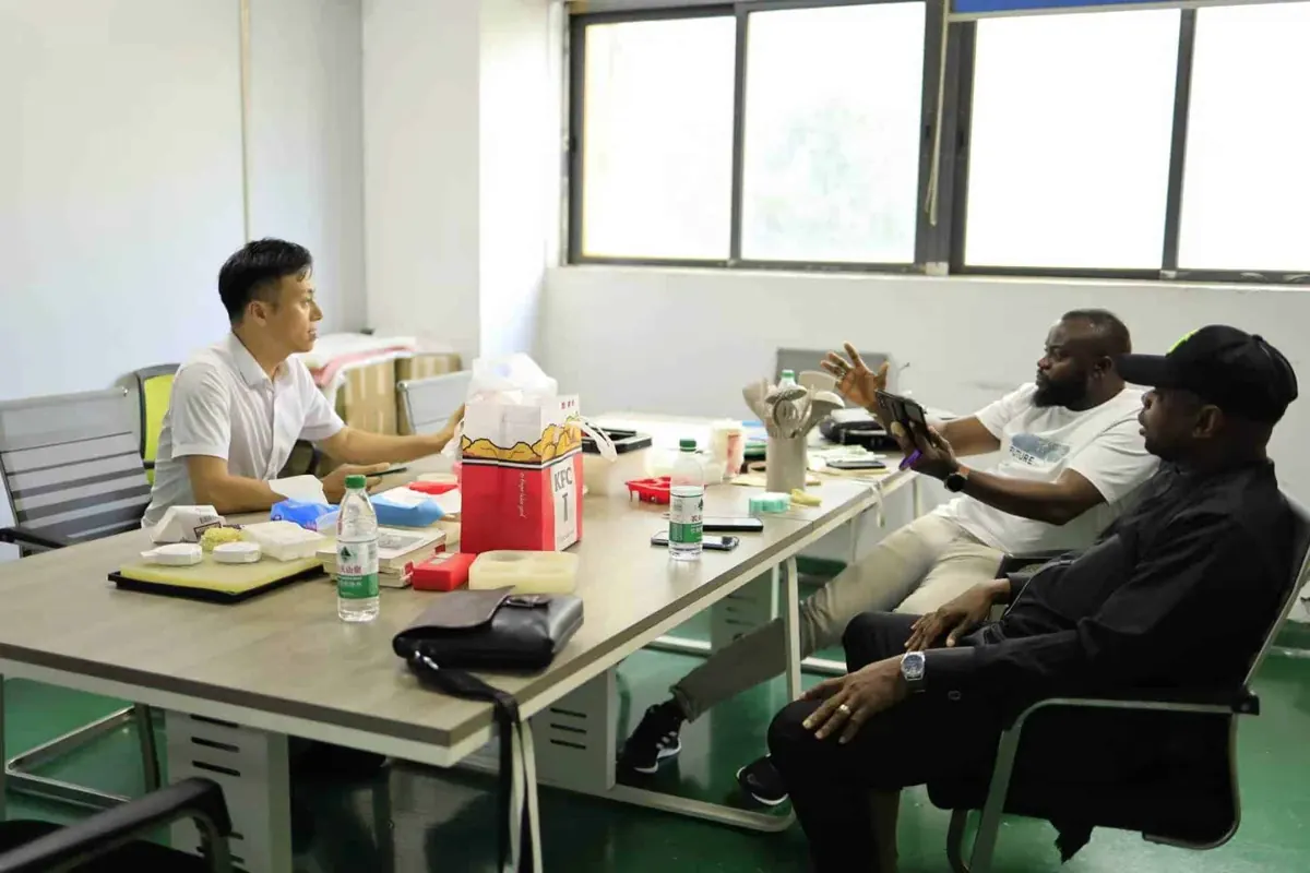 Buyer visit at the WYD Bao'an plant reviewing silicone molds