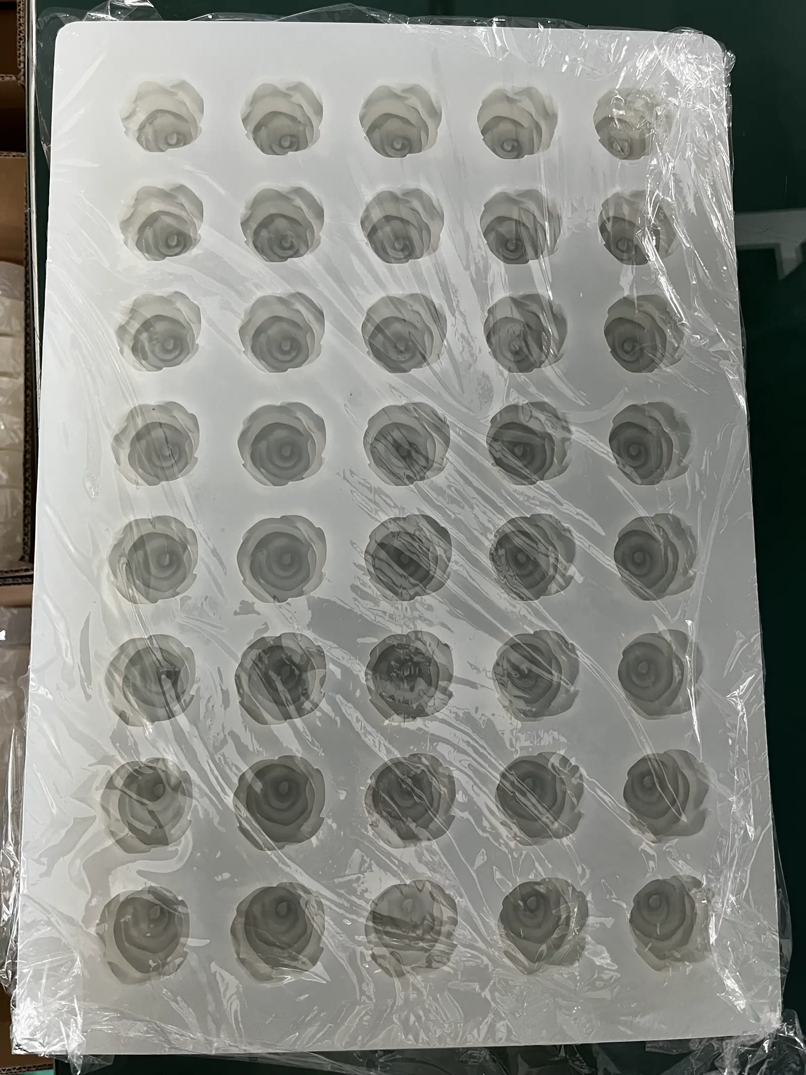 Rose cavity tray still covered in pack film