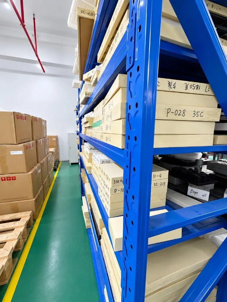 Labeled steel mold storage racks at the WYD Bao'an plant